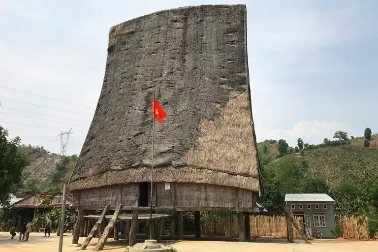Tall-roofed Rong communal house in a Kon Tum village.